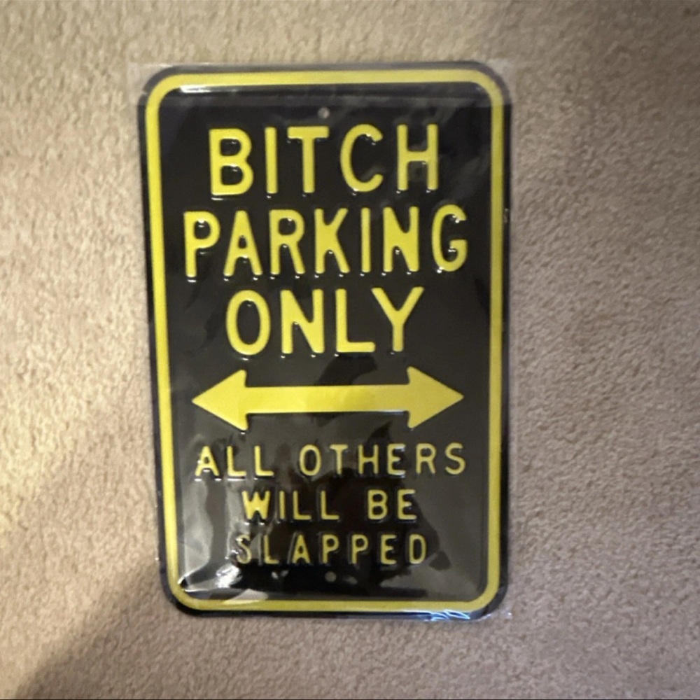 Humorous Black and Yellow Parking Sign